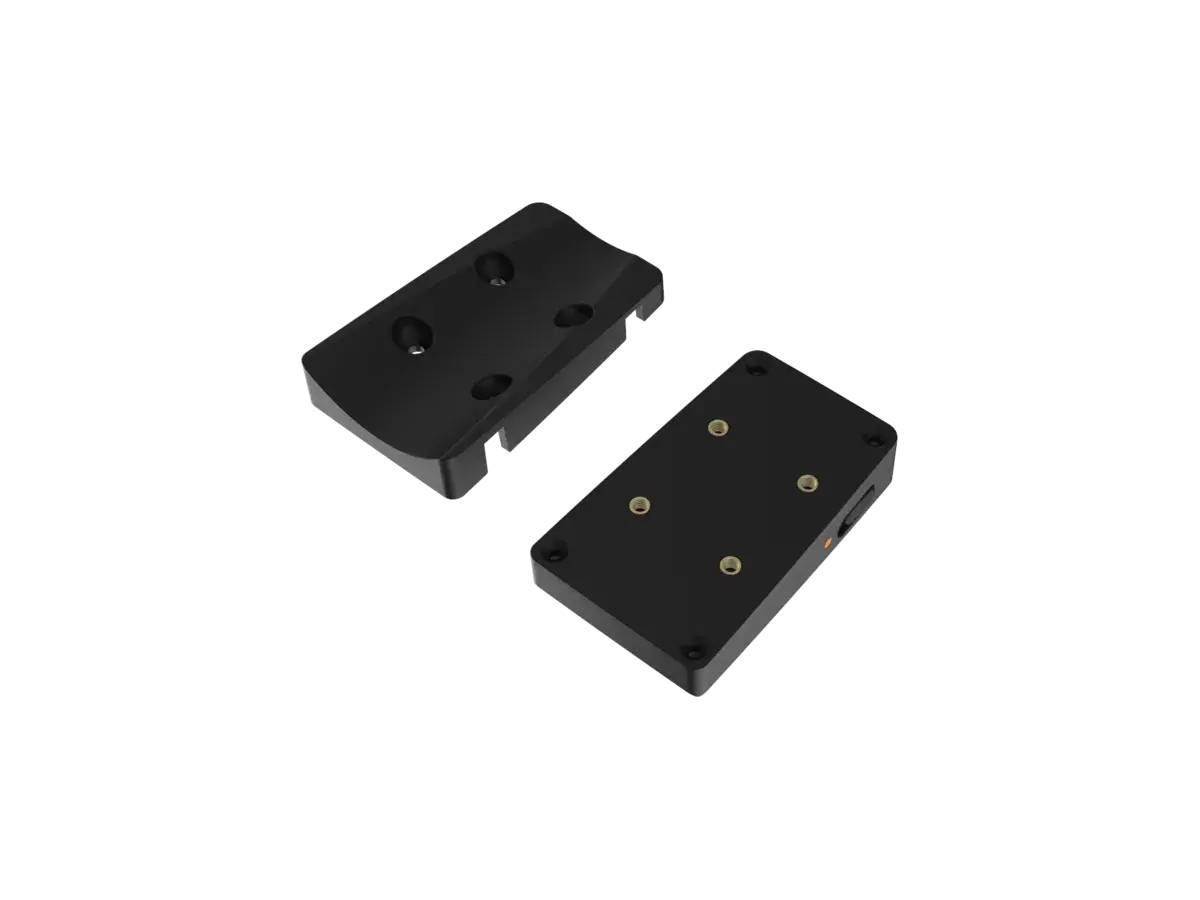 Two black mounting plates for the BYB Chrono shown apart, one face up and one face down, with brass threaded inserts and a keyed rail that lets the two slide together.