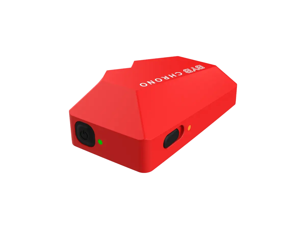 One red BYB Chrono external trigger beacon: the same wedge-shaped body as the timer, in red, with a power button, a green light and an amber light.