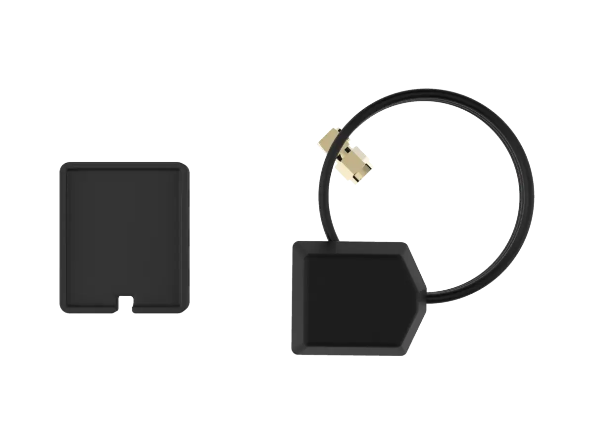 The BYB Tech GPS antenna beside its underside, the cable looped to show the gold coaxial connector that screws into the acquisition unit.