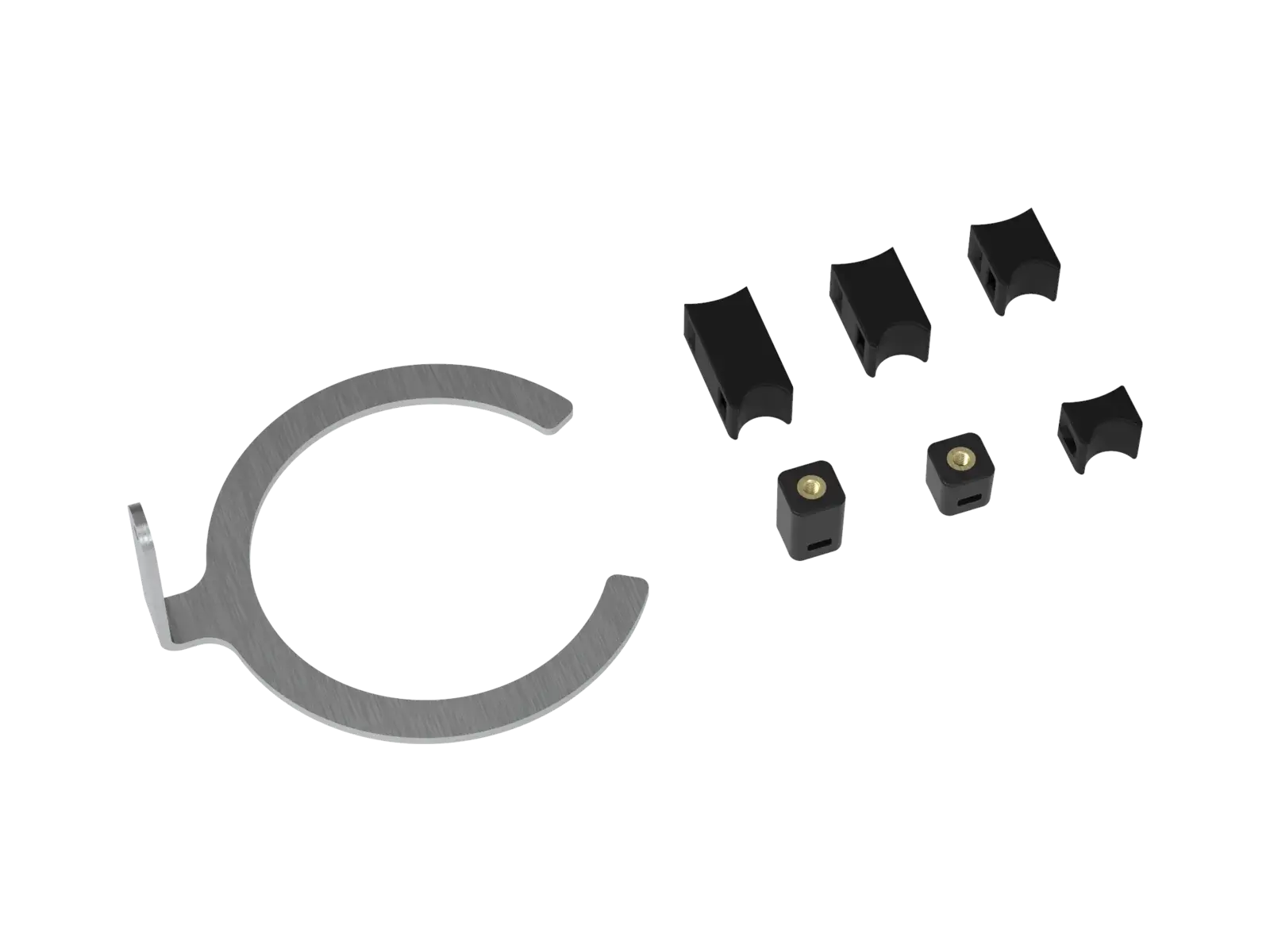The same MX shock kit at a three-quarter angle, showing the depth of the curved shims and the threaded bosses on the two blocks.