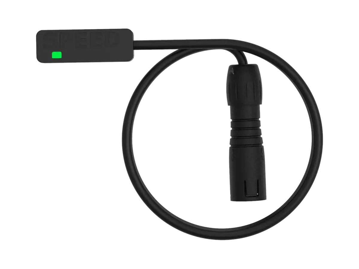 The BYB Tech speed sensor with a V3 connector: a slim body with SENSOR moulded into it and a green indicator, a coiled cable, and a straight all-plastic keyed plug on the end.