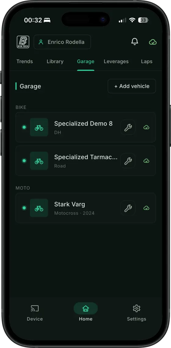 The BYB Telemetry app's Garage: a downhill bike and a road bike under Bike, a motocross bike under Moto, each with a setup button and a cloud mark showing it is synced.