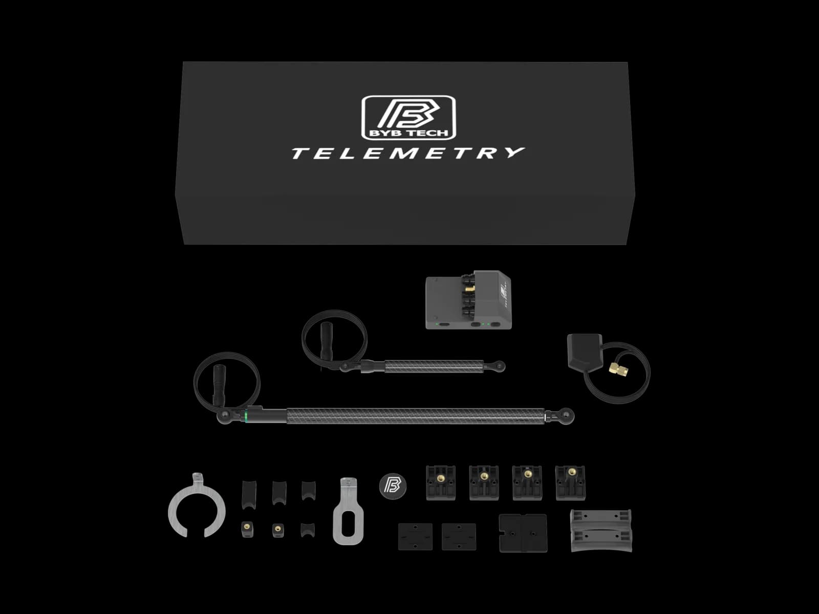The Telemetry V3 MTB kit laid out flat: the printed BYB Tech Telemetry case, a long and a short linear sensor, the acquisition unit's cradle, and the fork and shock brackets, shims and fasteners that fit a mountain bike.