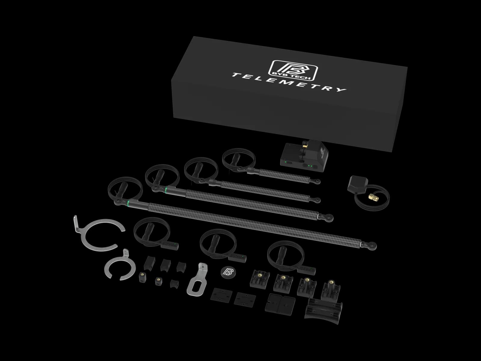 The same Telemetry V3 Pro MTB-MX kit from a three-quarter angle, the sensors and brackets laid out so the carbon bodies and the smaller spacers and fasteners read separately.
